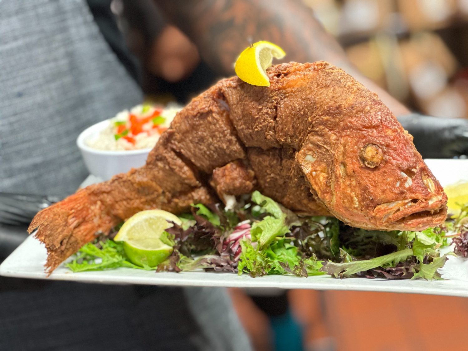 Whole fried snapper served family style